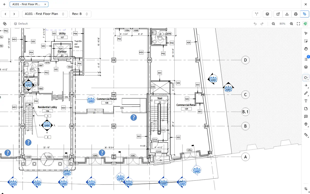 A revision cloud drawn over a drawing detail, selected and showing its handles, then reshaped by dragging a point.